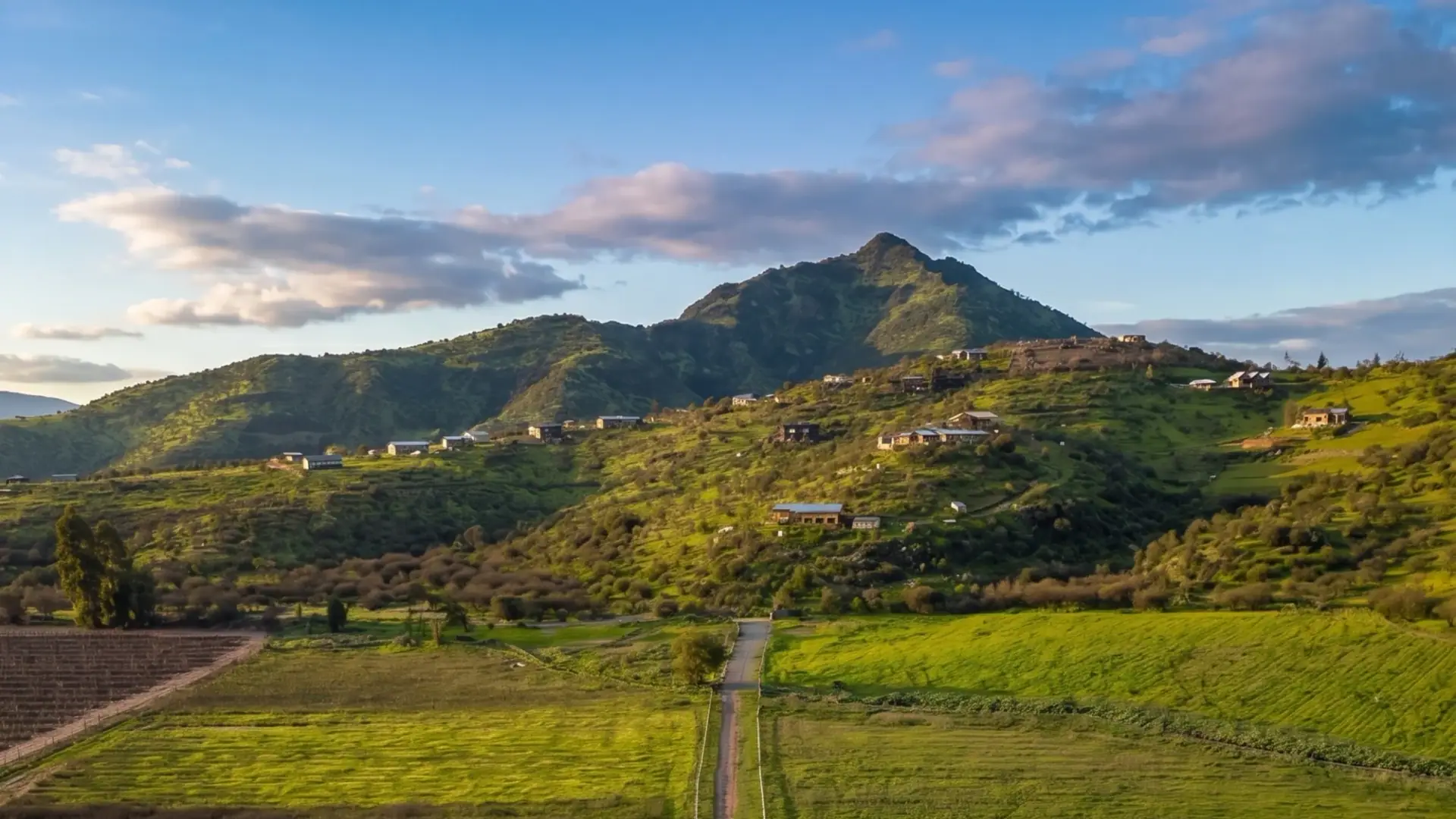 Terrenos y paisaje suburbano con potencial de crecimiento